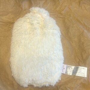 Warmies bottle heating or cooling pad. Cream color, NWOT, never used.